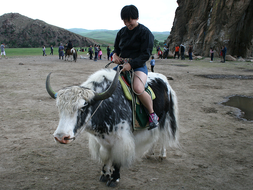 jenn riding a yak